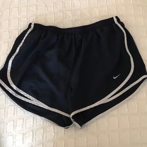 Navy blue dri fit Nike running shorts